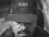 man wearing security cap