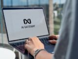 Person typing on laptop with ai gateway logo.