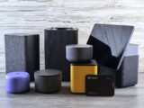 Collection of modern electronic devices and speakers.