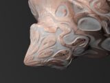 a close up of a sculpture of a dog's head