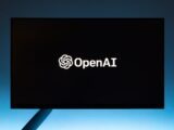 the open ai logo is displayed on a computer screen