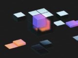 a group of cubes that are on a black surface