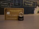 closeup photo of American Express Business card on brown surface