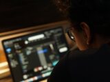 a man looking at a computer screen