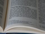 An open book sitting on top of a table