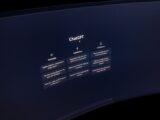 Close-up of a computer screen displaying ChatGPT interface in a dark setting.