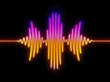 A colorful sound wave on a black background