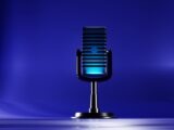 A microphone on a stand on a blue background