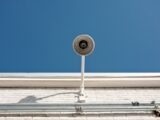 white and black round wall mounted device