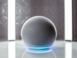Close-up of a spherical smart speaker with illuminated base, perfect for modern interiors.