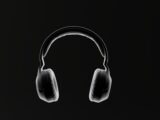 a pair of headphones on a black background