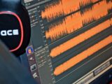 black and red headphones on black computer monitor