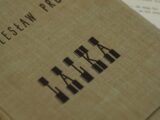 a close up of a book on a table